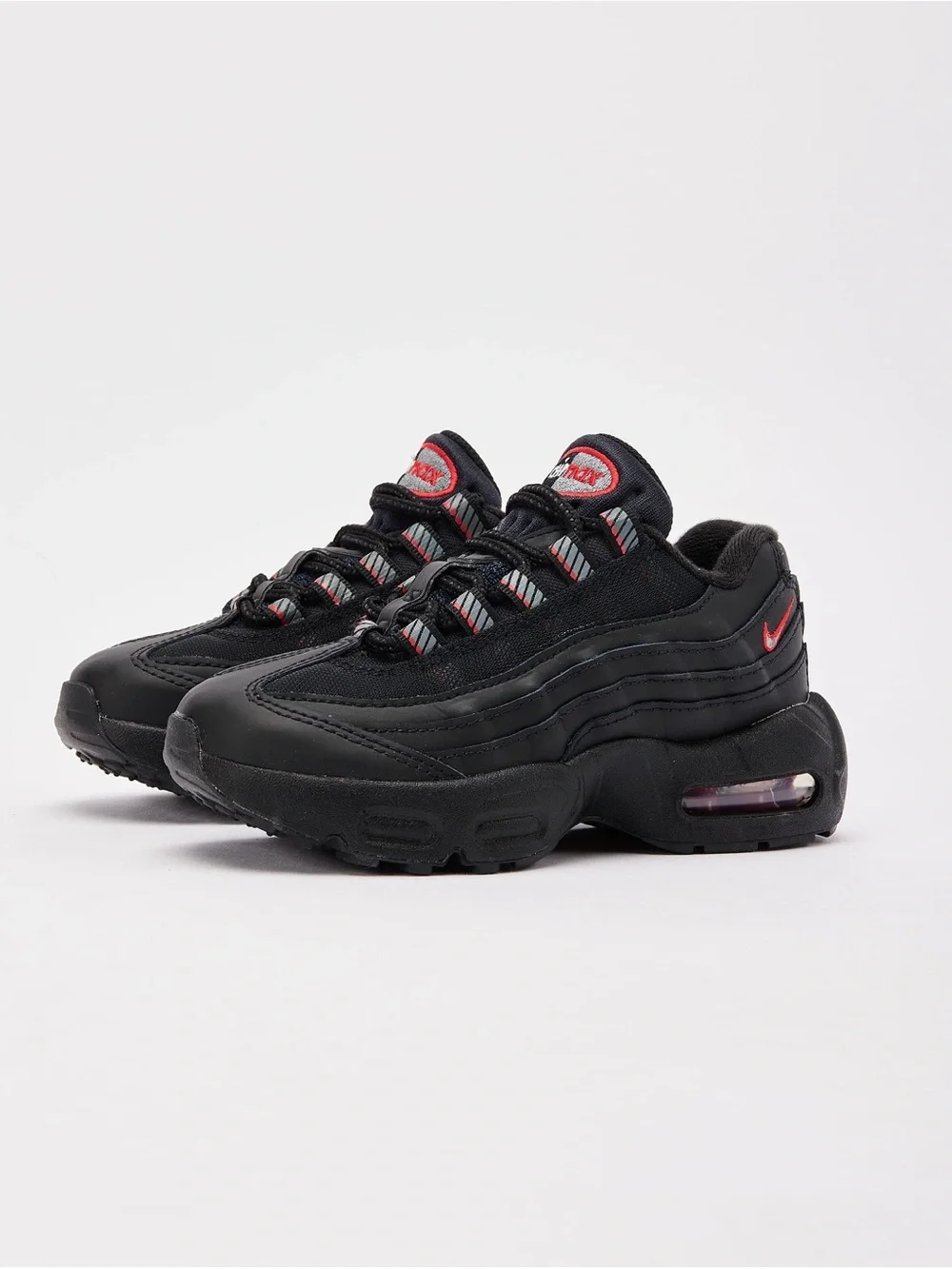 Nike Kids Black Sneakers with Red Accents